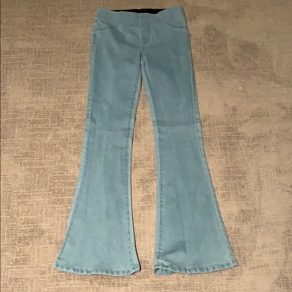 Umgee jeans, very big flare at bottom.